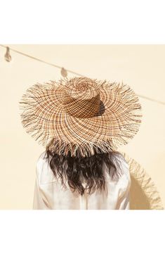 You'll look vacation-ready in this wide-brimmed sun hat crafted from multicolored palm straw. Palm straw Spot clean Made in the USA of imported materials Coastal Style Sun Straw Hat For Beach, Beige Sun Straw Hat For The Beach, Beige Sun Straw Hat For Beach Season, Wide Brim Woven Panama Hat, Woven Sun Hat For Summer, Woven Panama Hat For Vacation, Natural Woven Sun Hat For Beach Season, Beige Coastal Panama Hat For Vacation, Beige Coastal Style Panama Hat For Vacation