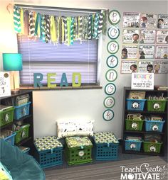 a room filled with lots of green and blue boxes in front of a white wall