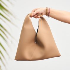 This clutch is your new best friend! Classy enough for a night on the town and casual enough for a day at the shops. It's the perfect size to fit all the essentials. 13.75" wide, 6" inch pouch with about an 8.5" handle drop. Versatile On-the-go Hobo Bag, On-the-go Rectangular Soft Leather Clutch, Chic Bags With Zipper Pouch For On-the-go, Modern Everyday Satchel Clutch, Chic Soft Leather Pouch For Everyday, Everyday Pouch With Detachable Top Handle, Chic Everyday Satchel Pouch, Chic Everyday Shoulder Pouch, Chic Everyday Shoulder Bag Pouch