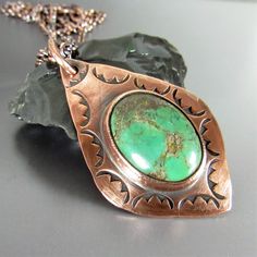 "Beautifully rustic solid copper leaf shaped pendant with a lovely large green turquoise cabochon. The turquoise has a delightful coppery matrix that is complimented by the copper setting and background. The stamped design is made by a stamp we designed for embellishing and gives just enough additional interest but allows the stone and copper to take center stage. Often times the simpler the design the better especially when you want the focus on the stone. Nice weight to the copper chain which Antique Gold Earrings, Orange Necklace, Copper Leaf, Turquoise Pendant Necklace, Wedding Gifts For Bridesmaids, Copper Chain, Wedding Bridesmaid, Rhinestone Bracelet, Handmade Copper