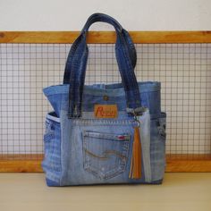 Denim Distressed Shoulder Bag For Daily Use, Daily Use Distressed Denim Shoulder Bag, Distressed Denim Shoulder Bag For Daily Use, Handmade Denim Tote Shoulder Bag, Everyday Distressed Denim Bag, Upcycled Medium Wash Recycled Denim Shoulder Bag, Everyday Distressed Denim Blue Bag, Distressed Denim Blue Bag For Everyday Use, Distressed Tote Shoulder Bag For Everyday Use