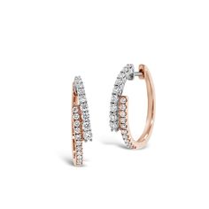 These sleek crossover earrings are a modern take on the classic diamond hoop. They’re an ideal way to add a sophisticated edge to any ensemble. -18K gold weighing 4.57 grams -40 round diamonds totaling 0.57 carats Available in yellow, white, and rose gold. Please allow 4-6 weeks for delivery if item is not in stock. Item no. E10399 Rose Gold Hoop Earrings, Diamond Earrings Design, Diamond Signet Ring, Elephant Pendant Necklace, Diamond Heart Pendant Necklace, Diamond Jewelry Designs, Heart Pendant Diamond, Diamond Hoop Earrings, Diamond Pendant Necklace