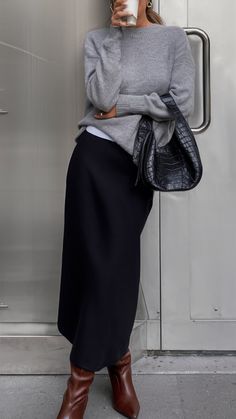 29 Black Skirt Outfit Ideas for 2025: Casual, Summer, Party Styles & More Black Long Skirt Outfit Ideas, Black Knit Midi Skirt Outfit, Black Maxi Skirt Outfit Winter, Polka Dot Midi Skirt Outfit, Long Grey Skirt Outfit, Black Maxi Skirt Outfit Ideas, Black Skirt Outfit Ideas, Black Midi Skirt Outfit, Black Maxi Skirt Outfit