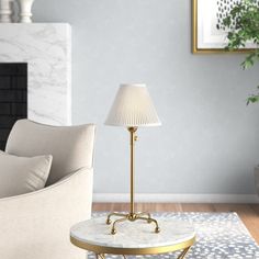 a living room scene with focus on the floor lamp and table in the foreground