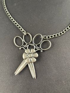 Whimsical scissor flower creation, made for that special person that loves doing what they do, with scissors. Great way to remind them of what they love. Scissor Jewelry, Scissors Jewelry, Scissor Necklace, Special Person, Jewelry Necklace Pendant, Jewelry Necklaces, Pendant Necklace, Pendant, Flowers