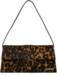 Hair-on leather and buffed leather shoulder bag in brown. · Graphic pattern printed throughout · Detachable buffed leather shoulder strap · Logo hardware at face · Card slot at back face · Magnetic flap · Card slot at interior · Cotton twill lining · Gold-tone hardware · H5 x W11 x D2.25 Supplier color: Leopard brown Cheetah Print, Leopard Print Bag, Jacquemus Bag, Leopard Bag, Fancy Bags, Mode Ootd, Pretty Bags, Cute Bags, Printed Bags