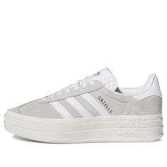 The adidas Gazelle Bold 'Grey White' is a timeless classic that has been a staple in the sneaker world since the 70s. This modern iteration features a three-layer construction with a buttery soft suede upper, jagged 3-Stripes and a rubber sole to keep it sporty. Inspired by the original silhouette, this sneaker is perfect for everyday activities and will add a stylish touch to any outfit. The muted grey and white colorway will ensure you stand out from the crowd. Get your hands on this iconic sn Good Shoes For Back To School, Cute Low Top Shoes, Addias Gazzels, Shoes For School 2024, Shoe Ideas For School, Grey Adidas Campus, Popular Shoes 2024, Back To School Shoes 2024, Trending Shoes 2024