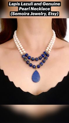 This elegant and captivating double-strand necklace is designed with the deep and mysterious hues of lapis lazuli and natural genuine pearls. The rich dark blue color of the necklace plays a prominent role in the overall design, lending it a sophisticated and striking appearance. Navy blue symbolizes wisdom and depth; it promotes calmness and inner peace while also exuding a powerful presence. Lapis lazuli takes center stage in this necklace, with its deep blue tone reminiscent of the night sky. Throughout history, this stone has been revered as a symbol of wisdom and strength, known for its ability to enhance mental clarity and spiritual balance. The deep blue agate pendant adds a refined depth to the design. Blue Beaded Necklace With Pearl Drop For Gift, Blue Double Strand Pearl Necklace For Gift, Blue Double Strand Pearl Necklace Gift, Blue Beaded Necklace For Birthday, Blue Round Beads Necklaces For Birthday, Blue Round Bead Necklaces For Birthdays, Blue Beaded Necklace For Birthday With Round Beads, Blue Double Strand Beaded Pearl Necklace, Spiritual Balance