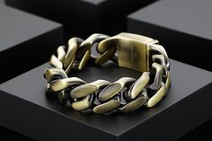 This vintage bracelet offers a luxury party style for endless fun. Styled of stainless steel, this bracelet is themed in a geometric design that makes a perfect style pick. This staple bracelet can be a birthday gift. Wear this bracelet to make a statement on special occasions to radiate eclectic charm effortlessly. Specifications Style: Hiphop/Rock Stainless Steel Bracelets For Men: Mannen Armband Shape\pattern: Geometric Origin: Mainland China Occasion: Party/Birthday Gifts/Gifts For Him Model Classic Metal Bracelets For Gifts, Classic Adjustable Cuban Link Bracelet For Gift, Gold Stainless Steel Chain Bracelet Nickel Free, Metal Wristband With Bracelet Strap As Gift, Trendy Metal Bracelets With Stainless Steel Clasp, Modern Metal Wristband As Gift, Modern Metal Wristband Gift, Elegant Stainless Steel Wristband For Gift, Stainless Steel Clasp Chain Bracelet As A Gift