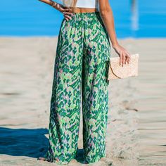 Add a pop of color to your wardrobe with the Green and Pink Abstract Wide Leg Pants, featuring a playful abstract print and comfortable wide-leg silhouette for a chic and vibrant look. Infuse your summer wardrobe with a touch of playfulness and vacation charm by incorporating the Green and Pink Abstract Wide Leg Pants. Product code: CAA02D4C007RP Spring Abstract Print Wide Leg Bottoms, Summer Wide Leg Bottoms With Abstract Print, Wide Leg Bottoms With Abstract Print For Summer, Casual Green Summer Pants, Green High-waisted Printed Bottoms, Green High Waist Printed Bottoms, Multicolor Printed Wide Leg Vacation Pants, Vacation Multicolor Printed Wide Leg Pants, Multicolor Printed Wide Leg Pants For Vacation