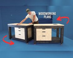 a man is working on a workbench with two drawers and one drawer labeled woodworking plans