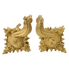 A fine and remarkable pair of Javanese high karat gold (22k+) earrings in the form of a conch shell, 12th to 15th century, Java, Indonesia. The Indonesian gold earrings cast in 22k gold and worked with fine filigree and granulation to the surface. The earrings retain their original hinges, and were either meant to be worn as ear ornaments, or possibly cord fasteners. A modern 18k gold post back makes them functional as earrings for today's wearer. The form of the earrings bear special significan Antique Gold Earrings For Festivals, Traditional Yellow Gold Clip-on Earrings, Traditional Yellow Gold Hallmarked Clip-on Earrings, Gold Earrings With Historical Design For Wedding, Yellow Gold Earrings With Historical Design As Gift, Antique Earrings With Historical Design For Ceremonial Occasions, Traditional Yellow Gold Earrings With Historical Design, Ornate Gold Earrings With Historical Design, Antique Yellow Gold Ceremonial Earrings