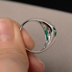 This is a gorgeous handmade creation. Its beauty is its simplicity & Elegance. The 6*6mm round shape faceted lab emerald is crafted in solid sterling silver and with rhodium plated. All item is sent in a beautiful gift box If you have any idea of design your ring,pls contact me directly. You can realize more lovely stuff clicking the link https://www.etsy.com/shop/knightjewelry?refshopsection_shophome_leftnav Please leave the correct address and you phone number for delivering successfully. Emerald Ring With Prong Setting In Round Cut, Emerald Rings With Prong Setting And Round Cut, Emerald Ring With Prong Setting And Round Cut, Polished Emerald Ring For Wedding, Emerald Crystal Ring Fine Jewelry, Open Emerald Ring With Bezel Setting For May Birthstone, Emerald Diamond Promise Ring, Solitaire Round Emerald Ring For Promise, Round Solitaire Emerald Promise Ring