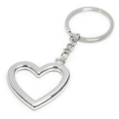 a heart shaped metal keychain on a white background