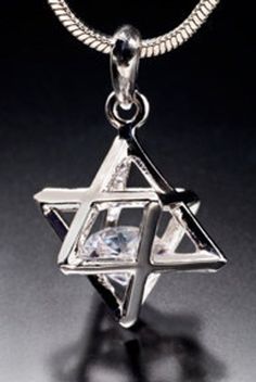 Part of sacred geometry, the Merkaba originates from Egypt and represents Man reaching up to God and God reaching down to Man. It is the vehicle to help get mind, body, and spirit in sync. It is in most major religions and metaphysical thought Merkaba pendant with chain $125.00 Merkaba earrings with leverbacks $150.00 Merkaba earrings with banana clips $150.00 Merkaba earrings with clip-ons $150.00 Mystical Star-shaped Jewelry Gift, Spiritual Star-shaped Jewelry Gift, Spiritual Star-shaped Jewelry For Gifts, Mystical Star Charm Jewelry Gift, Symbolic Star-shaped Jewelry As Gift, Mystical Star Charm Jewelry For Gift, Mystical Jewelry With Star Charm For Gifts, Mystical Star-shaped Necklace For Gift, Symbolic Star Of David Necklace For Gift