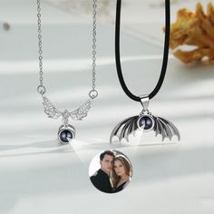 ### Custom Photo Projection Necklace for 2 **Description The Custom Photo Projection Necklace for 2 is a unique and personalized piece of jewelry that allows you to carry cherished memories with you wherever you go. This necklace features a pendant that can project custom images, creating a meaningful and visually stunning accessory. The pendant is designed for two photos, making it an ideal token for couples, friends, or family members. **Benefits 1. **Personalized Keepsake This necklace provides a customizable way to cherish memories by incorporating two special photos.    2. **Emotional Connection Wearing the necklace allows individuals to maintain a deep emotional connection with the images and the people represented in them. 3. **Unique Projection Feature The projection technology add Black Stainless Steel Jewelry For Anniversary, Black Couple's Necklace As Gift, Black Engraved Jewelry For Anniversary Gift, Black Engraved Jewelry For Anniversary, Customizable Silver Couples Jewelry, Customizable Black Jewelry For Valentine's Day, Personalized Black Necklace For Anniversary, Customized Black Jewelry For Valentine's Day, Black Personalized Jewelry For Keepsake