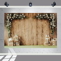 an image of a stage set up for a wedding ceremony with flowers on the wall