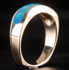 14k Yellow Gold AA Opal Inlay Wave Style Ring 7.2gMetal Information: 14k Yellow GoldTotal Weight: 7.2gBand Width: 3.3mmSize: 9.75Stone InformationMain StoneGem Type: OpalShape: InlayColor: MultiClarity/Quality: AANumber of Stones: 7Estimated Retail Price: $1610.00OUR PRICE: $1285.00SizingMany of our pieces can be re-sized at the buyers request. Please email us if you require our skilled professional services.45911 Opal Rings With Polished Finish For Formal Occasions, Formal Opal Rings With Polished Finish, Classic Opal Jewelry With Polished Finish, Modern 14k Gold Opal Ring With Polished Finish, Modern Opal Ring In 14k Gold With Polished Finish, Formal 14k Gold Opal Ring With Polished Finish, Formal 14k Gold Polished Opal Ring, Polished Yellow Gold Opal Ring, Fine Jewelry 14k Gold Opal Ring With Polished Finish