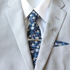 Wiley Blue Floral Men's Tie Blue Tie Floral Tie - Etsy Elegant Blue Cotton Suit And Tie Accessories, Blue Floral Print Suit And Tie Accessories For Business, Fitted Blue Floral Suit And Tie Accessories, Blue Ties With Pocket Square For Wedding, Blue Groom Suit Accessories With Pocket Square, Blue Ties And Pocket Square For Groom, Blue Tie With Pocket Square For Groom, Blue Pocket Square For Wedding, Floral Tie Groom