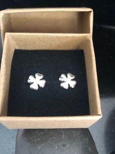 These tiny .925 solid sterling four leaf clover stud earrings are petite and just so cute. Great gift for one who prefers minimal jewelry. 🍀 They measure approximately 8.6mm, are soldered, tumbled and finished with sterling silver butterfly backs. The photos are enlarged to show all the details. ~~ All jewelry from The Black Lotus Jewelry Co. will arrive securely packaged in a gift box with a lovely ribbon. Perfect for gift giving or a wonderful treat for yourself! Thank you for supporting my l Tiny Sterling Silver Flower Earrings As Gift, Tiny Sterling Silver Flower Earrings, Sterling Silver White Gold Flower Earrings For Gift, Gift White Gold Sterling Silver Flower Earrings, White Gold Sterling Silver Flower Earrings Gift, Nickel-free White Gold Flower Earrings As Gift, Hypoallergenic White Gold Flower Earrings In Sterling Silver, Classic Silver Flower Earrings For Gift, Classic White Gold Flower Earrings For Gifts