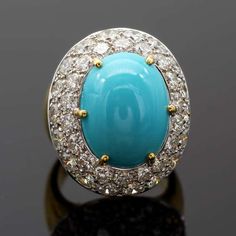 For Sale on 1stDibs - A Large dome shaped cocktail Ring set with a very fine turquoise surrounded by two rows of top quality diamonds weighing in total 4,60 carats. Ring Size: Fine Jewelry Turquoise Diamond Ring, Hallmarked Turquoise Ring Fine Jewelry, Hallmarked Turquoise Fine Jewelry Ring, Luxury Turquoise Diamond Ring, Elegant Polished Turquoise Ring, Luxury Turquoise Diamond Ring As Gift, Turquoise Diamond Ring With Center Stone, Elegant Turquoise Diamond Ring, Luxury Turquoise Cabochon Ring In Yellow Gold