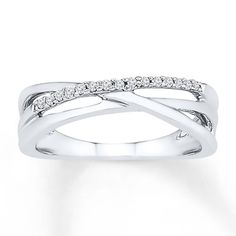 a white gold ring with diamonds on it