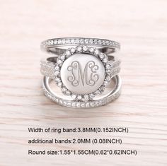 Discover Elegance with Our Sterling Silver Monogram Ring Uniquely Yours, Expertly CraftedExperience the perfect blend of luxury and personalization with our Engraved Stacking Monogram Ring. This exquisite piece is meticulously handcrafted from the finest 925 sterling silver, ensuring a lasting shine. Its high-polished finish is beautifully complemented by the brilliance of nestled cubic zirconia, adding a touch of sparkle to your everyday look. Personalize ItMake it uniquely yours! This ring all Monogram Rings, Stackable Name Rings, Round Monogram, Personalized Initial Ring, Mothers Ring, Heart Square, Stackable Ring Sets, Silver Monogram, Mother Jewelry