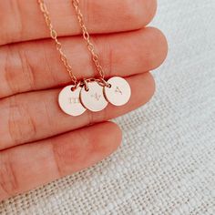 Dainty and elegant, our initials disc necklaces are truly a bestselling classic! Carry either their initials or choose from our wide array of symbols that best represent them, this everyday necklace is lightweight and perfect for holding all your loved ones close to your heart. Each mini disc measures 9mm & fits 1 birth flower and (optional) initial each Choose your symbols from our mini disc symbols chart attached (we do not carry any other symbols outside of these selections) Pendant can only Dainty Hand Stamped Round Disc Necklaces, Dainty Hand Stamped Round Disc Necklace, Adjustable Hypoallergenic Initial Pendant Jewelry, Hypoallergenic Initial Pendant Charm Necklace, Minimalist Initial Pendant Coin Necklace For Gift, Minimalist Initial Pendant Coin Necklace As Gift, Minimalist Nickel-free Initial Pendant Charm Necklace, Minimalist Initial Round Disc Necklace, Dainty Hand Stamped Initial Pendant Charm Necklaces