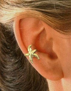 "Ear Charms® Fun Starfish Ear Cuff Non-Pierced Side Cartilage Non-pierced Earring Crawler - Reminiscent of the Seaside & Reminds Us of Summer. Solid Sterling Silver 925 Starfish, Also available in Yellow Gold or White Rhodium over the Sterling Silver for a Carefree Finish. Fully Adjustable, Comfortable & Secure Carry or Gift Box to keep them in & Simple Instructions Included. Ear Charms® Inc. 1982 - 2021 / Sandra Callisto designer (Hand carved & cast using the \"Lost Wax Method\" Adjustable Summer Ear Cuff As Gift, Summer Star-shaped Jewelry For Pierced Ears, Gold Star Earrings For Summer, Ear Cuff Earrings, Jewelry Beautiful, Climber Earrings, Ear Cuff Earings, Dope Jewelry, Funky Jewelry