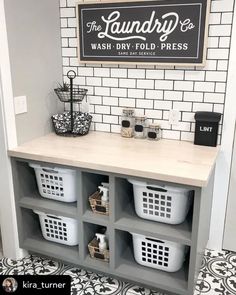 the laundry room is clean and ready to be used as a wash dry fold press