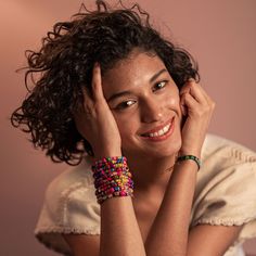 These bracelets and necklaces were handmade with LOVE in Guerrero and Puebla, Mexico by women artisans from the co-op Flor de Mexico, led by Araceli Flores. The motto behind Flor de Mexico is ‘History Made by Women’—LOVE! The majority of the palm used in these bracelets is collected from communities nestled in the mountains near Atlixtac, Zapotitlan Tablas, Ahuacoutzingo and Copanatoyac. The beads are handcrafted and dyed over 3-5 days in Guerrero and then passed off to the artisans in Puebla wh Beaded Wrap Bracelet As Gift, Colorful Beads Bracelets For Friendship, Spiritual Bracelets With Colorful Beads, Fair Trade Multicolor Beaded Bracelets As Gift, Multicolor Bohemian Beaded Bracelets, Fair Trade Festival Bracelets, Colorful Beaded Bracelets For Festival, Everyday Artisan Multicolor Jewelry, Multicolor Hand Wrapped Jewelry