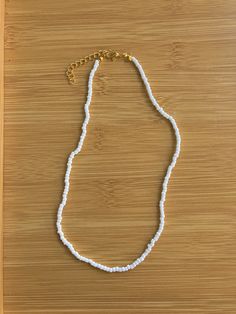 white seed bead necklace. age size, 9yrs - 24yrs. waterproof beaded necklace handmade with love by Addi. Everyday White Single Strand Necklace, Adjustable White Beaded Chain, White Heishi Beads Jewelry For Vacation, White Minimalist Beaded Bracelets For Summer, Everyday White Single Strand Beaded Necklace, Minimalist White Beaded Bracelets For Summer, Handmade White Strand Beaded Necklaces, Handmade White Beaded Strand Necklace, White Single Strand Beaded Bracelet For Gift