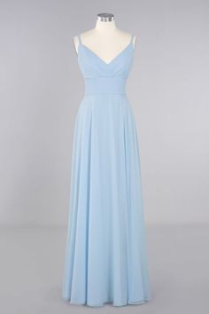 a light blue bridesmaid dress on a mannequin