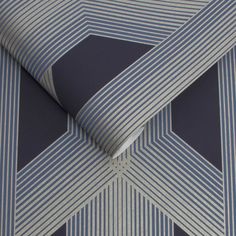 a close up view of a tie with blue and white stripes on it's diagonal design