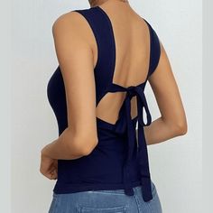 Please refer to our sizing chart for a guideline when choosing a size. 5 business days order processing time. 90% polyester 10% spandex. Chic Cross Back Tie Back Top, Chic Cross Back Top With Tie Detail, Elegant Crew Neck Tank Top For Summer, Versatile Backless Tie-back Top, Elegant Stretch Tank Top With Crew Neck, Elegant Stretch Crew Neck Tank Top, Elegant Crew Neck Stretch Tank Top, Chic Fitted Crew Neck Tank Top, Elegant Backless Top With Tie Back