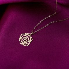 Embrace the timeless beauty of our 14K Solid Gold Adjustable Rose Flower Necklace for Women. This exquisite necklace features a delicate rose flower pendant crafted from solid 14K gold. The adjustable chain allows for a perfect fit, ensuring both comfort and style. The rose symbolizes love, beauty, and femininity, making it a meaningful and elegant accessory. Whether worn for everyday elegance or to add a touch of romance to special occasions, this necklace is a stunning choice. Capture the esse Gold Rose Pendant, Elegant Rose Gold Flower Charm Necklaces, Elegant Rose Gold Flower Charm Necklace, Rose Gold Flower-shaped Necklace As Gift For Her, 14k Rose Gold Jewelry With Flower Charm, Rose Gold Flower Pendant Charm Necklace For Wedding, Rose Gold Necklace With Flower Pendant And Roses, Rose Gold Flower Pendant Necklace In Fine Jewelry Style, Elegant Rose Flower Pendant Charm Necklaces