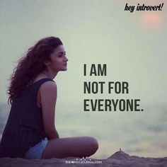 a woman sitting on top of a beach next to the ocean with a quote above her