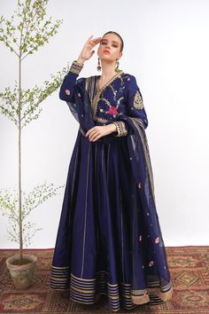 A royal blue frock in raw silk with embroidery on the bodice and a matching net dupatta with kiran along its width. Finished with a jamawar trouser for a regal touch.3-piece suitReady to wear Traditional Blue Sets With Sheer Dupatta, Blue Traditional Drape Sets With Sheer Dupatta, Blue Sets With Sheer Dupatta In Traditional Drape, Blue Raw Silk Anarkali Set For Diwali, Diwali Blue Cotton Silk Anarkali Set, Blue Anarkali Cotton Silk Sharara, Designer Blue Silk Sharara, Blue Anarkali Set With Sheer Dupatta For Festive Occasions, Festive Blue Chanderi Anarkali Set