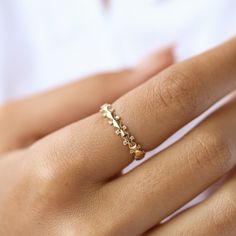 Discover the elegance of our 14k gold ring, beautifully adorned with sparkling zircon stones. This delicate, handcrafted ring is perfect for women who appreciate minimalist jewelry with a touch of luxury. Whether you prefer rose gold, yellow gold, or white gold, this stackable ring fits seamlessly into any collection. Ideal as an anniversary gift, birthday gift, or a thoughtful Mother's Day gift, it's a versatile piece that can be worn every day. Crafted with care, this dainty ring embodies the Gold Moissanite Stackable Rings As Gift, Dazzling Gold Eternity Band Gift, Diamond Half Eternity Birthstone Ring Gift, Gift Diamond Half Eternity Birthstone Ring, Promise Eternity Band With Diamond Accents In 14k Gold, Cubic Zirconia Half Eternity Birthstone Ring As Gift, Yellow Gold Crystal Ring With Diamond Accents For Promise, Dazzling 14k Gold Diamond Ring As Gift, Gold Half Eternity Crystal Ring Gift