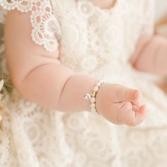 Handmade in the USA A sweet gift for your baby girl. When shopping for the perfect baby shower gift it will be difficult to find something else quite as classic as this white luster pearl bracelet with sterling silver heart charm. Arrives in an elegant laced lined metal box for a cute presentation. Also makes a perfect baptism or first birthday gift! White luster pearls Sterling silver heart charm **Please note that the bracelet should be worn under adult supervision and contains small parts** Baby Christmas Stocking, Heirloom Gifts, Baby Jewelry, First Birthday Gifts, Perfect Baby Shower Gift, Sweet Gifts, Create Outfits, Metal Box, Baby Boutique