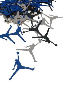 many blue and white paper cut figures are in the shape of people on a white background