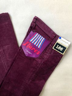 Amazing pair of vintage corduroy pants in deep rich burgundy with a low rise, slim fit and flared legs. Locally sourced from a closed down jeans store, they still have the original Lee manufacturing tag from the 1960s! The corduroy fabric is made from 100% cotton in Belgium and the pants close with a talon 42 zipper and Lee button. We recommend that you buy your fit by following these measurements, Waist: 70cm / 27.5'' Front rise: 23cm / 9.0'' Seat: 80cm / 31.5'' Inseam: 79cm / 31.0'' Label size Flared Corduroy Pants, Corduroy Flares, Jeans Store, Deep Burgundy, Corduroy Pants, Jeans Shop, Sweden, Favorite Outfit, Mid Rise