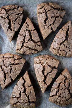 six pieces of brownie sitting on top of a table