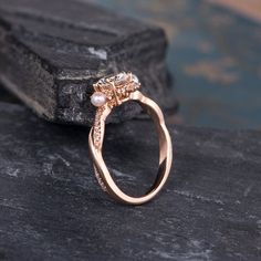 Moissanite Engagement Ring Rose Gold Infinity Wedding Band Akoya Pearl Birthstone June Bridal Ring Diamond Women Anniversary Gift For Her ITEM INFORMATION: Metal Type- Solid 14K Rose Gold Ring Size Available- US3# -10# *Engagement Ring Details： WIDTH-( approx. 1.3mm ) 1.Center Stone- 6mm Moissanite, D-E-F, VVS 2.Side Stones - Natural Diamond Weight - 028ct Clarity - SI Color - H 3. Side- Natural Pearl Size: 2.5mm **Stone Replacement** Available with any other gemstones, please feel free to conta Anniversary Pearl Ring With Halo Setting And Cubic Zirconia, Anniversary Pearl Ring With Halo Setting, Elegant Pearl Ring With Halo Design For Wedding, Round Cut Pearl Ring With Halo Setting For Wedding, Elegant Wedding Pearl Ring With Halo Design, Round Cut Halo Setting Pearl Wedding Ring, Elegant Rose Gold Bridal Sets With Brilliant Cut, Elegant Rose Gold Jewelry For Marriage, Brilliant Cut Diamond Pearl Ring For Wedding