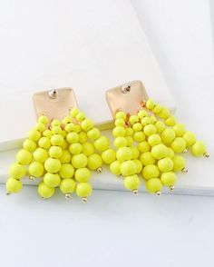 Beautiful statement earrings perfect for the summer ! Elegant Summer Earrings With Dangling Beads, Trendy Dangle Tassel Earrings For Summer, Trendy Summer Tassel Dangle Earrings, Elegant Yellow Tassel Earrings For Summer, Yellow Dangling Beads Earrings For Summer, Trendy Yellow Beaded Dangle Earrings, Trendy Gold Tassel Earrings For Summer, Summer Yellow Dangling Beads Earrings, Yellow Summer Earrings With Dangling Beads