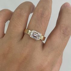 Elegant 1.0 CT Emerald Cut Engagement Ring|Half Bezel Set Ring|3 MM Flat Solitaire Band|Emerald Solitaire Ring|14k Solid Yellow Gold Jewelry ❤ ITEM DETAILS:- ✦ Brand: The American Gold House (TAGH) ✦ Handmade, high-quality item! ✦ Material: Solid 10K/14K/18K Gold, 950 Platinum and 925 Sterling Silver ✦ Diamond Type: Moissanite Diamond ✦ Diamond Cut: 7x5 MM Emerald ✦ Diamond Weight: 1.0 CT ✦ Diamond Color: Colorless ✦ Width of Band: 3.0 MM (Bottom) ✦ Diamond Clarity: VVS/VS ------------------------------------------------------------------------------ 💎 Moissanite VS Diamond 💎 ------------------------------------------------------------------------------ 👉 Moissanite Maintain Their Clarity & Sparkle Throughout A Lifetime Just Like A Diamond. 👉Moissanites Are Actually More Brilliant (Spa Marriage Vibes, Gold House, Half Bezel Setting, Solitaire Bands, Moissanite Vs Diamond, Half Bezel, Emerald Cut Engagement, Bezel Set Ring, Promise Ring Gift