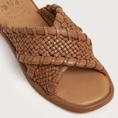 The hottest trend this season is woven sandals. DNA Footwear has you covered with the Woodruff sandal. Handwoven leather styled as a simple slide gives you the look of the season. Pair them with a floral print dress for a truly tropical outfit. You are going to LOVE these. Genuine leather uppers Woven leather straps Padded footbed for comfort Soft rubber outsoles STYLENAME: WOODRUFF-COG Summer Brown Woven Leather Sandals, Traditional Brown Woven Leather Sandals, Leather T-strap Sandals With Woven Sole For Summer, Spring Woven Leather T-strap Sandals, Waterproof Slippers, Brown Leather T-strap Sandals With Woven Sole, Tropical Outfit, Woven Sandals, Water Shoes