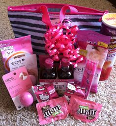 a pink hello kitty hamper with its contents