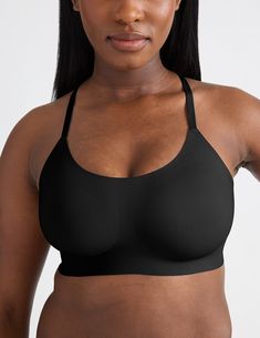 Flirty racerback style with a super smooth, seamless look and feel. While featuring a gorgeous lace back that's bringing sexy that's oh-so comfy. Offers light to medium support through the cup. | Knix Lace Racerback Bra in Black Strappy Back Stretch Camisole With Built-in Bra, Fitted Black Scoop Neck Bra, Fitted Smoothing Sports Bra, Black Fitted Scoop Neck Bra, Black Scoop Neck Bra, Seamless Stretch T-back Sports Bra, Smoothing Fitted Sports Bra, Black Seamless T-back Tank Top, Fitted Seamless Racerback Camisole