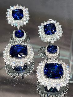 Luxury Polished Sapphire Jewelry, Formal Sapphire Dangle Diamond Earrings, Elegant Earrings With Diamond Accents And Lab-created Sapphire, White Gold Sapphire Jewelry With Sparkling Stones, Luxury Sapphire Diamond Earrings With Brilliant Cut, Sapphire Halo Design Drop Earrings, Formal Sapphire Cubic Zirconia Diamond Earrings, Luxury Sapphire Diamond Earrings, Exquisite Sapphire Earrings With Diamond Accents